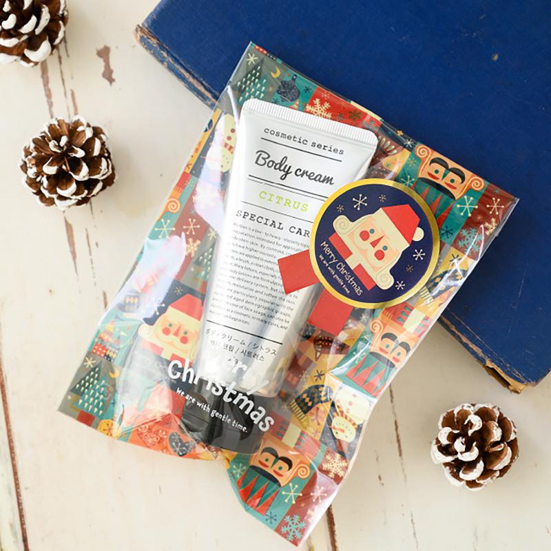 ギフト資材 XHK-1S クリスマス北欧リボン型シール-1(100枚) ヘッズ