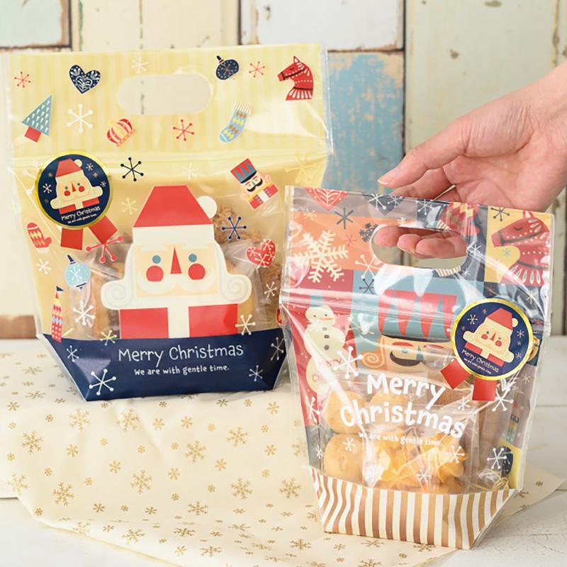 ギフト資材 XHK-1S クリスマス北欧リボン型シール-1(100枚) ヘッズ