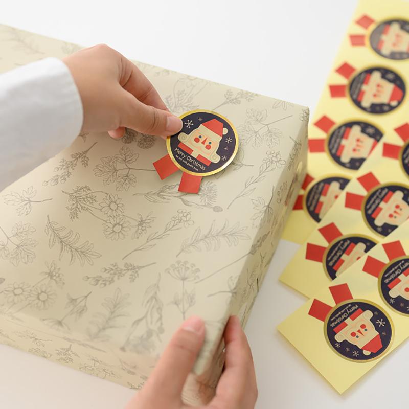 ギフト資材 XHK-1S クリスマス北欧リボン型シール-1(100枚) ヘッズ