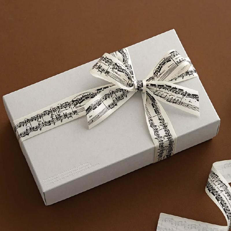 ギフト資材 MUN-STR1 ミュージカルノートサテンリボン-1 ヘッズ